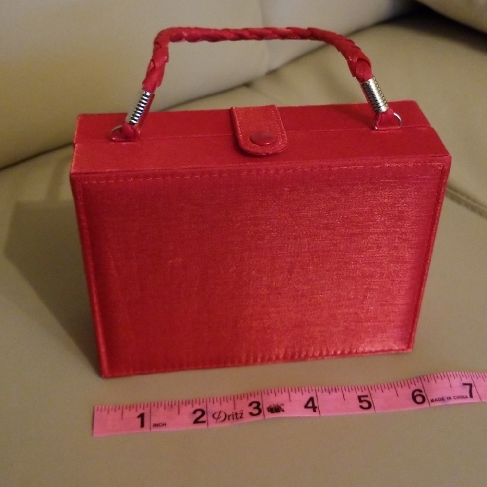 Satin purse with makeup samples
